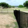 cast iron residential fence in home backyard
